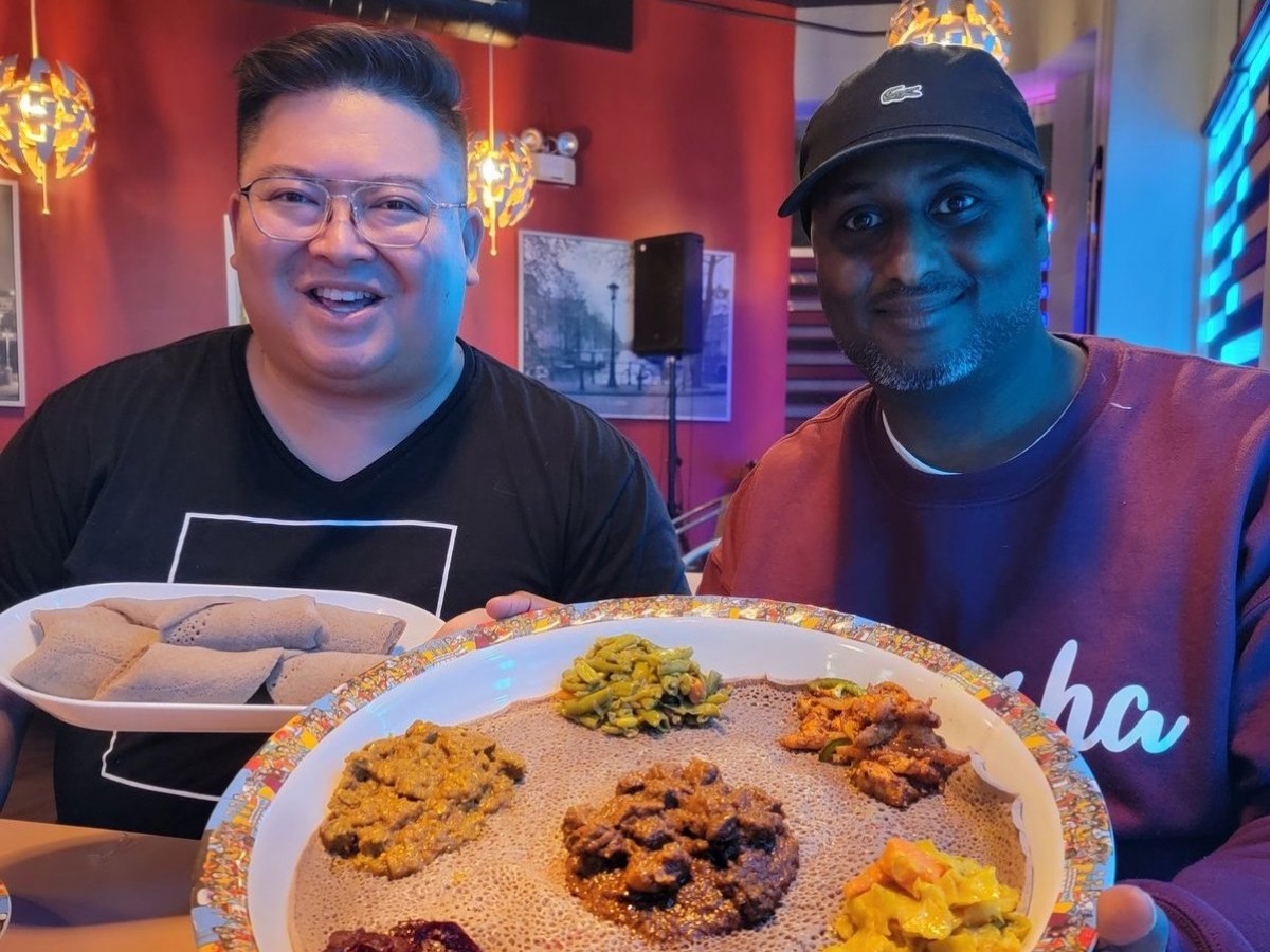 Injera that's near ya: a Winnipeg Ethiopian food guide - Carter Chen with his friend Merih Tesfaselassie at Merkato Restaurant (Carter Chen)