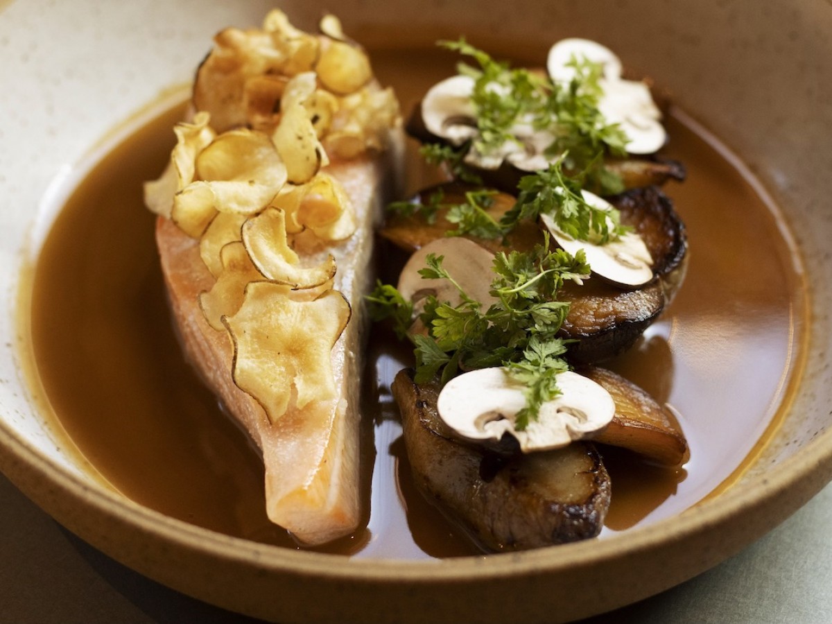 New & notable spots for May 2022 in Winnipeg - Duck fat poached salmon with sunchokes and fermented mushroom brown butter sauce from Two Hands in one sixteen (photo by Lauren Siddall)