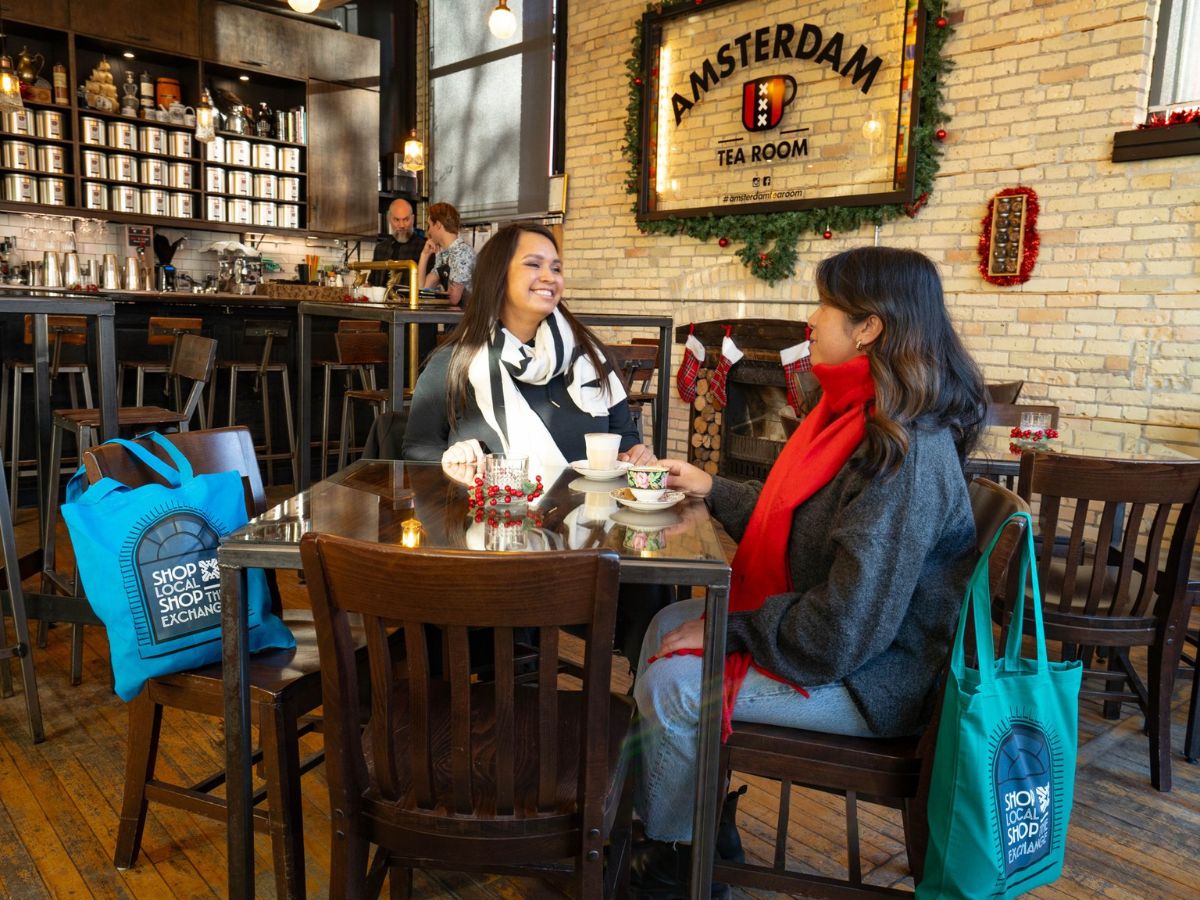 Tourism Winnipeg's 2023 holiday gift guide - Taking a break from shopping in the Exchange at Amsterdam Tea Room & Bar (photo Abby Matheson)