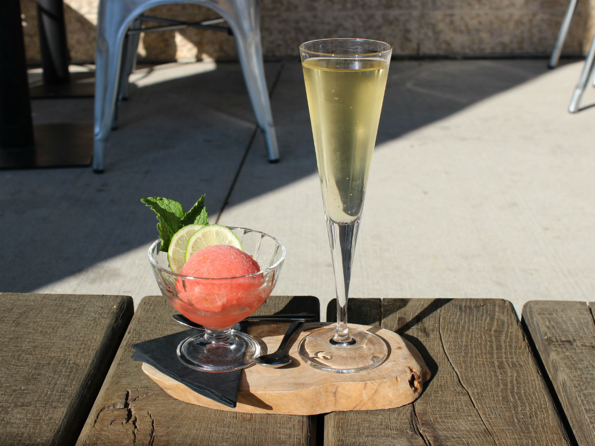 Patio season at SMITH is the ideal après-anything - The texture on this frozen treat is amazing, here sits the red ice paired white zinfandel 