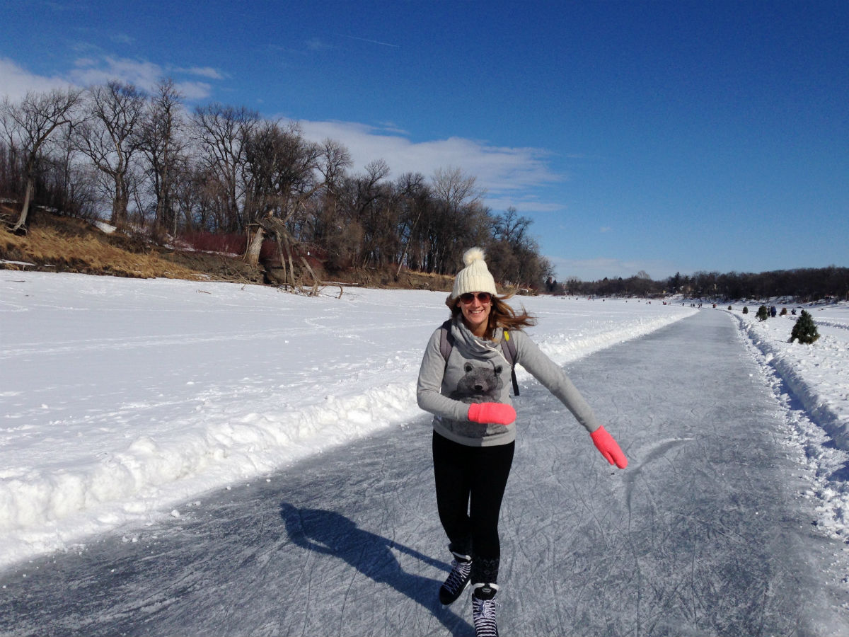 20 Ways Winnipeg Crushes it in Winter - You too will be this happy when you skate on the Red River Mutual Trail (Tourism Winnipeg)