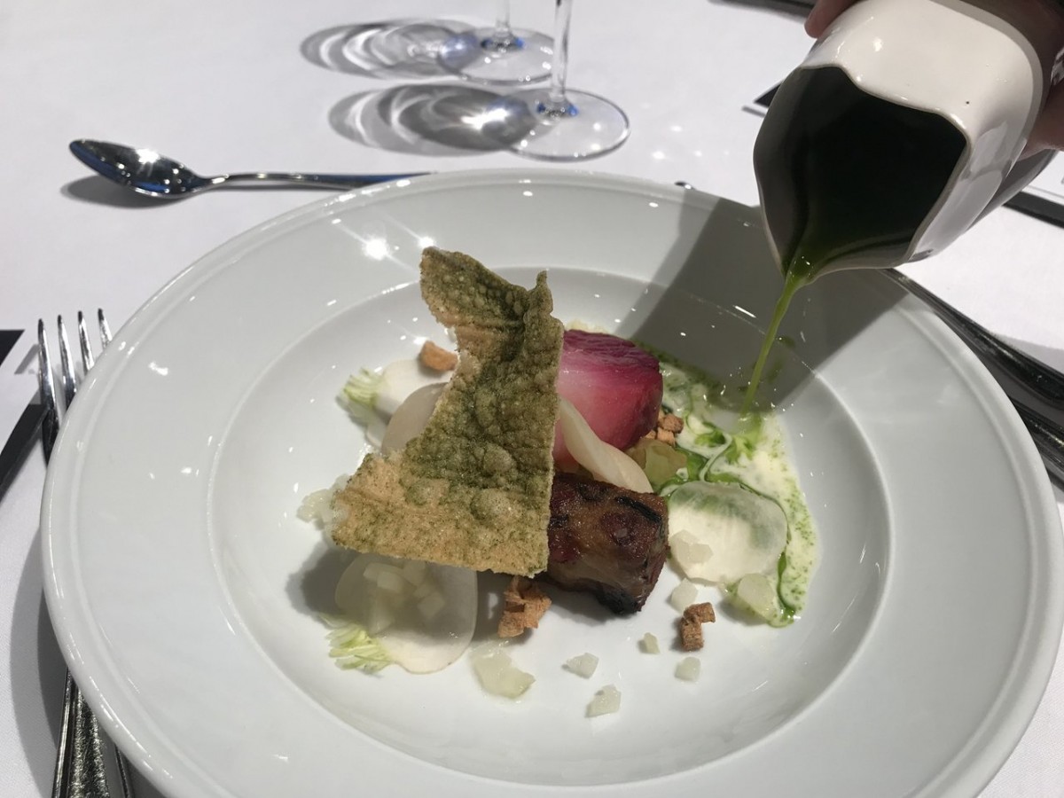 Emily Butcher takes gold at Canada's Great Kitchen Party - Turnip broth being poured onto chef Emily Butcher of deer + almond's winning dish (PCG)