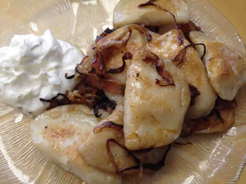 Pan fried perogies with grilled bacon and onions. (photo by robin summerfield)