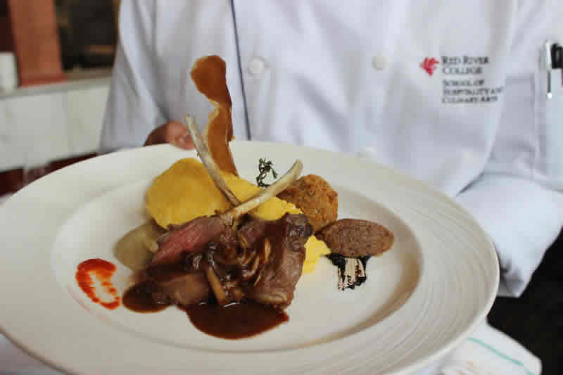 Lamb chops, lamb croquette and bacon jam by student Amiel Camet at Jane's. (photo by robin summerfield)