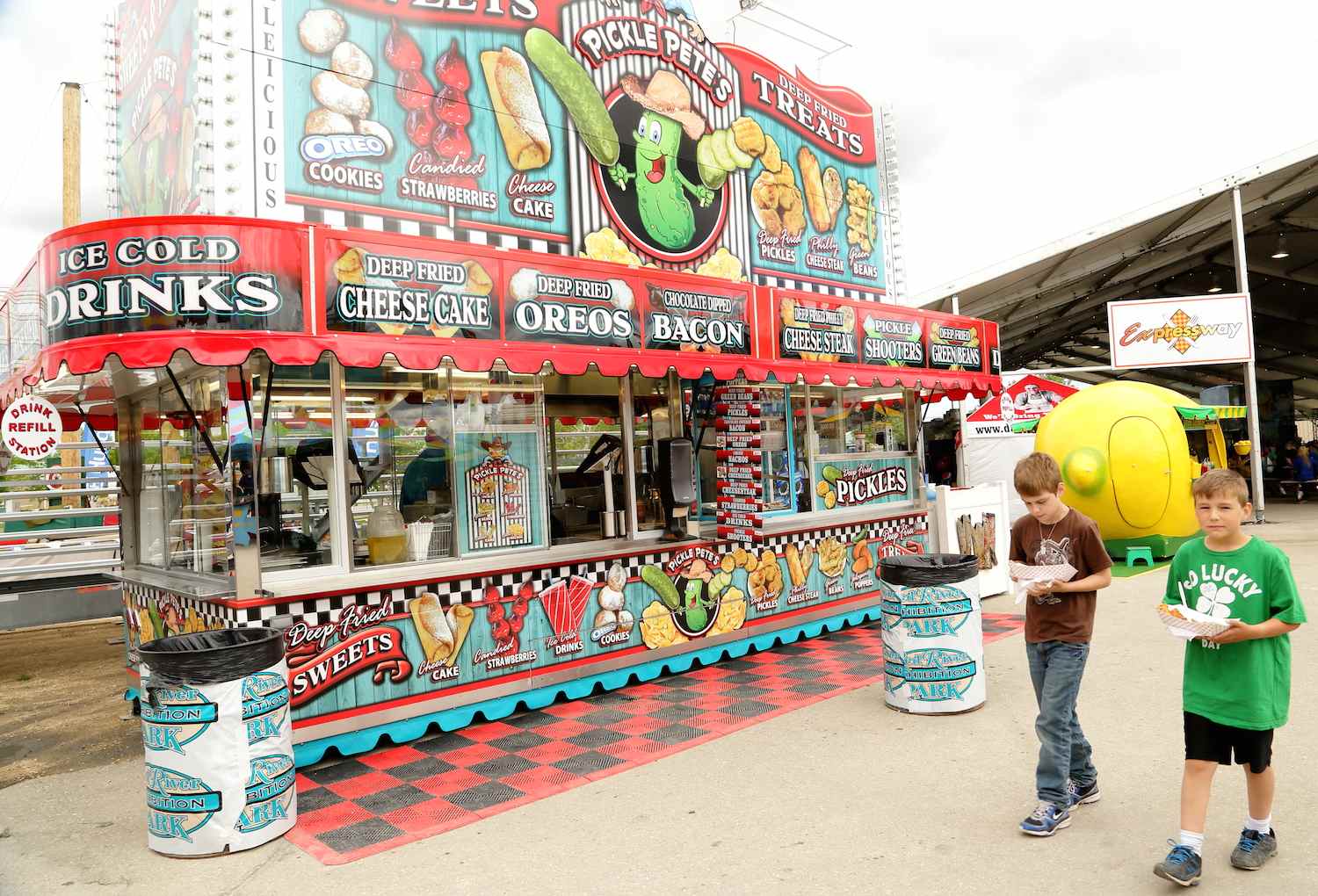 Indulging in midway eats is a Red River Ex ritual. (Photo courtesy Red River Exhibition.)
