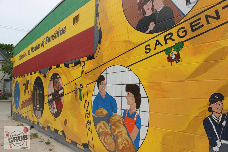 Winnipeg's West End is home to dozens of murals painted on buildings throughout the neighbourhood like this one outside Gohe. (Photo by Robin Summerfield.) 