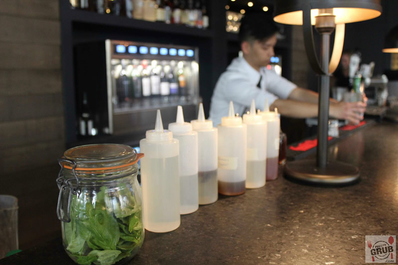 House-made bitters and simple syrups at the ready inside the lounge at Smith. 
