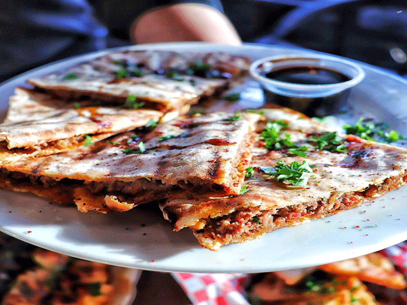Arayes – grilled pita bread sandwich with ground beef, tomato and onion.
Photo by: The Posh Foodie